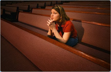 praying girl in church