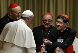 Pope Francis talks with Cardinal Tagle before morning session of synod